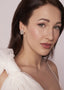 Swarovski crystal and cluster stud earring in silver on model side view