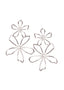 Open silver flower earring with pearl centers on white background.