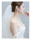 Silver Pearl and crystal stud earring on Bride side view