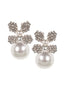 crystal flower and pearl stud earring in silver on white background