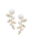 Golden Swarovski crystal and pearl left right earring on white background