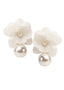 Ivory and gold Silk flower and oversized pearl earring on white background