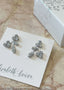 floral crystal stud earring on blush
marble back ground
