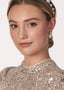 Silver Pearl and crystal stud earring on model in sequin dress front view