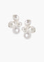 Pair of pearl and crystal earrings on a white background
