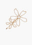 Gold flower-shaped hairpin with pearl centers on a white background