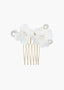 Hair comb with white floral attachments on a white background