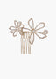 Bridal hair comb with floral designs and pearls on a white background