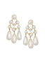Pearl statement earrings with 3 tear drop pearl drops on white background